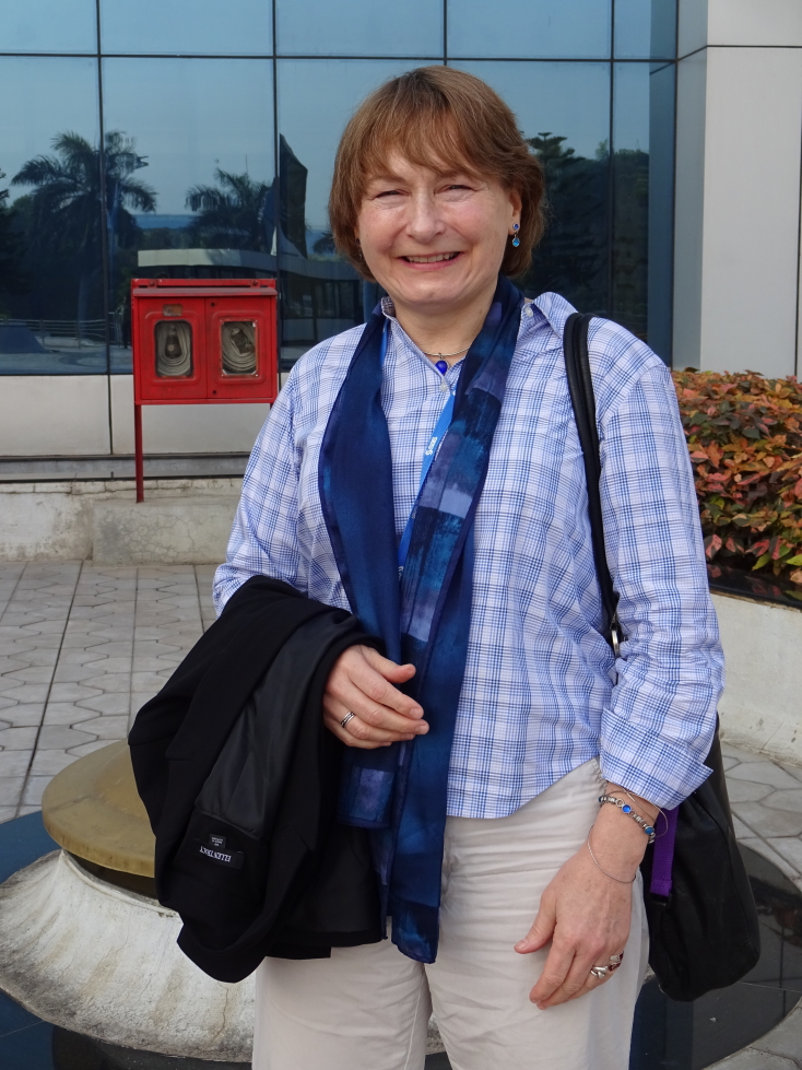 Lynneth in front of the office