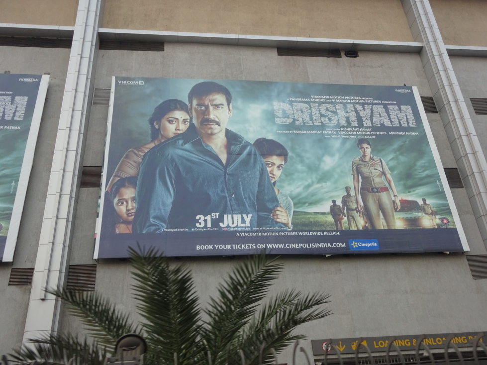 Bollywood poster on the outside wall of the movie theater near Margapatta City