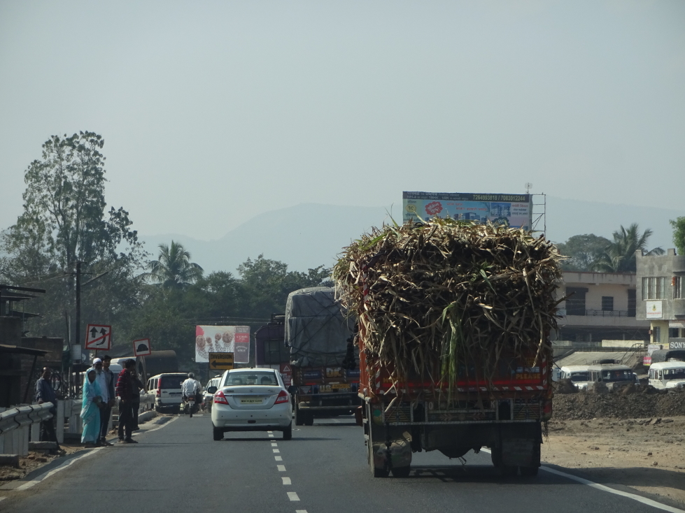 Truck overflowing with produce on the way to Mahabaleshwar