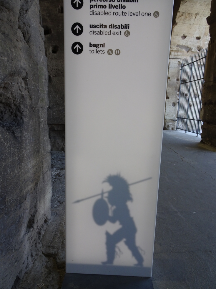 Cool projection of a gladiator on a Colosseum sign