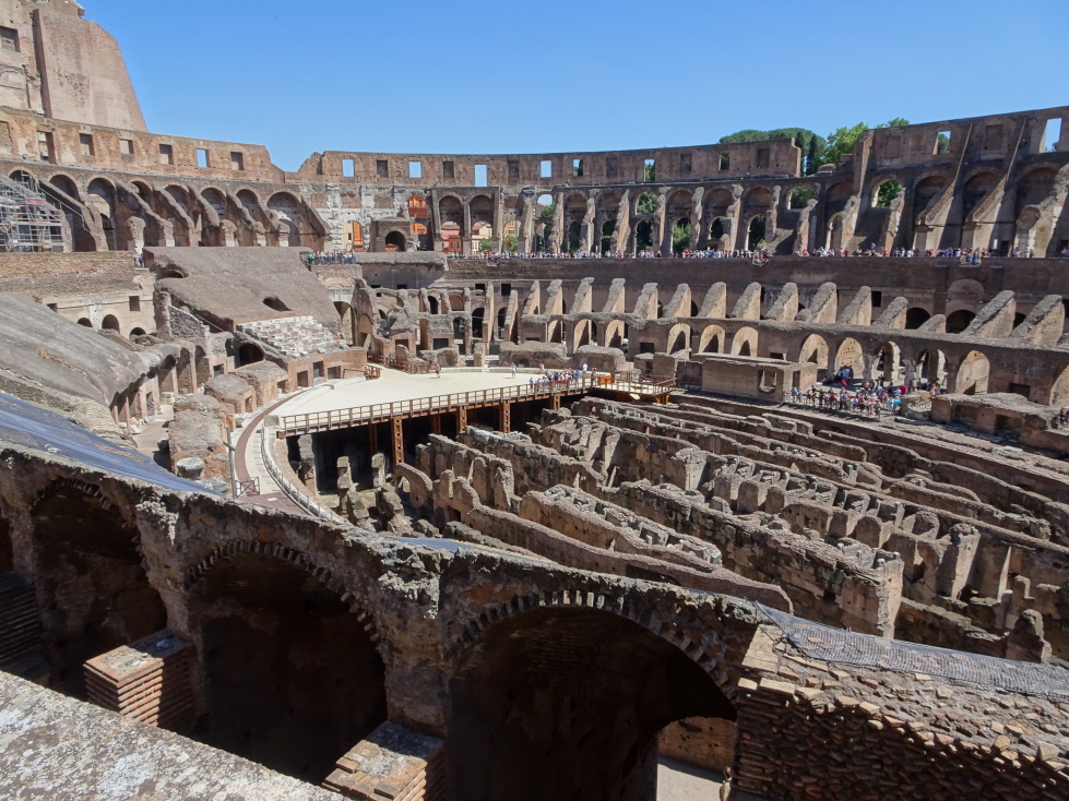 Looking down at the (reconstructed) main floor of the Colosseum at the far end