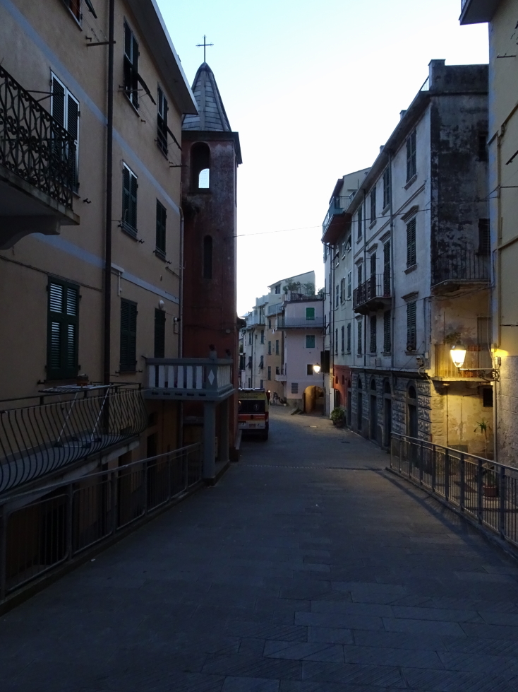 Dusk settles on Riomaggiore's main street
